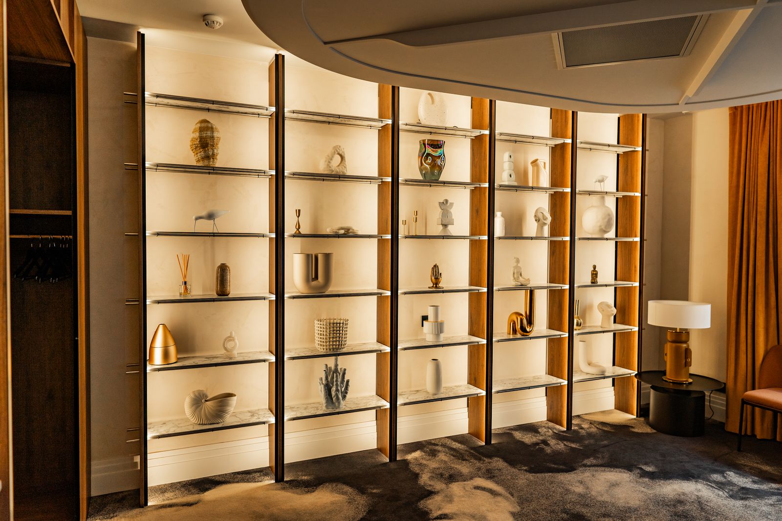 Lit shelving in a hotel