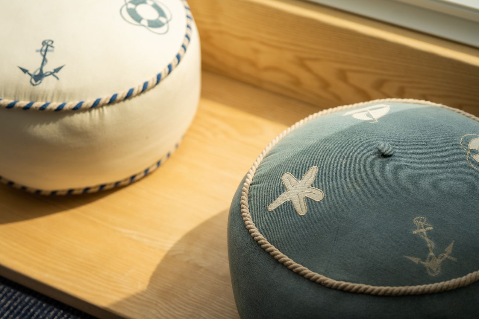 Detail of cushions embroidered with anchors